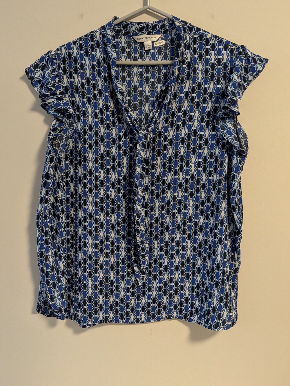 counterparts. Pullover Blue Geometric Tie-Neck Cap Flutter Sleeve Blouse. XL.
